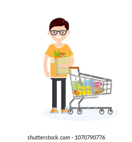 Cartoon flat illustration - a young guy makes purchases in a grocery store. food cart. a man shopping in the supermarket. a man carries a bag in his hands. walk on Mall.

