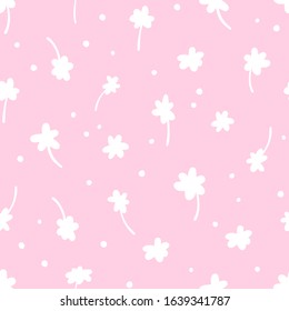 Cartoon floral seamless pattern. Hand drawing vector pattern of white flowers on a pink background. For wrapping paper, textile, packaging, background, postcard, print.