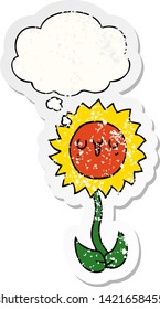 cartoon flower with thought bubble as a distressed worn sticker