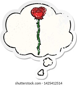 cartoon flower with thought bubble as a distressed worn sticker