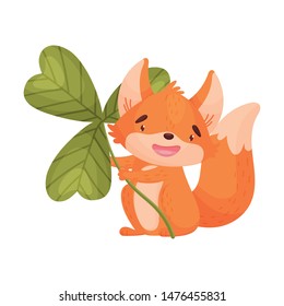 Cartoon fox with clover. Vector illustration on white background.