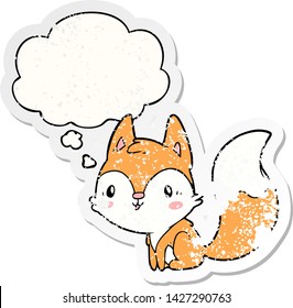 cartoon fox with thought bubble as a distressed worn sticker