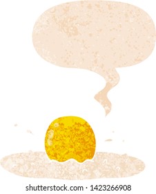 cartoon fried egg with speech bubble in grunge distressed retro textured style