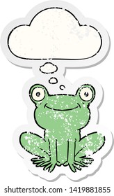 cartoon frog with thought bubble as a distressed worn sticker
