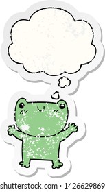 Cartoon-Frosch mit Denkblase als bedrückter abgenutzter Aufkleber