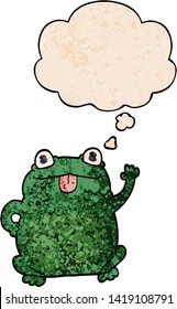 cartoon frog with thought bubble in grunge texture style