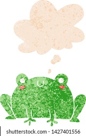 cartoon frog with thought bubble in grunge distressed retro textured style