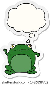 cartoon frog with thought bubble as a printed sticker
