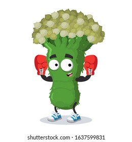 cartoon fungal spore mascot in red boxing gloves on white background