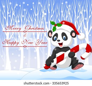 Cartoon funny baby panda holding Christmas candy with christmas background 