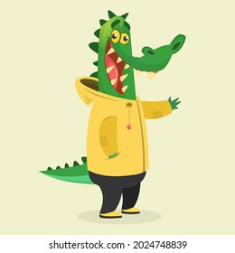 Cartoon funny and happy crocodile in a yellow rain coat. Aligator wearing clothing. Vector illustration isolated. Anthropomorphic.