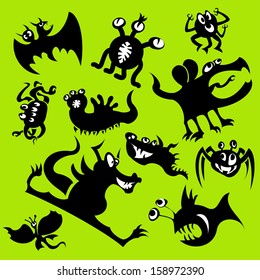 Cartoon funny monsters silhouettes. Vector set