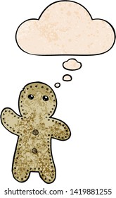 cartoon gingerbread man with thought bubble in grunge texture style