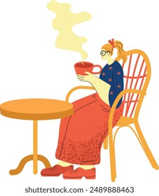 A cartoon girl with red hair and glasses is sitting in a chair at a table outside. She is wearing a blue shirt with white flowers and a red skirt. She is holding a red cup. Vector illustration.