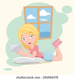 Cartoon girl smiling using computer tablet while lying on the ground.