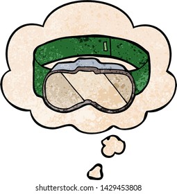 cartoon goggles with thought bubble in grunge texture style