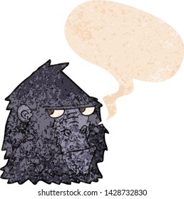 cartoon gorilla with speech bubble in grunge distressed retro textured style