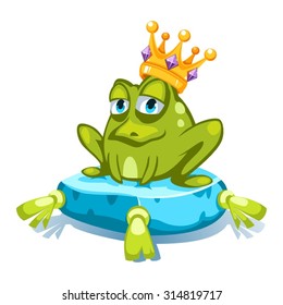 Cartoon green frog character with a crown with gemstones, sitting on a blue pillow