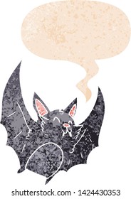 Cartoon-Halloween-Fledermaus mit Sprachblase im brüchigen Retro-Stil