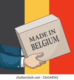 Cartoon, hand drawn human hands, holding a box, with made in Belgium sign, and a flag background, vector illustration