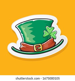 cartoon hand drawn saint patriks hat isolated on orange background. st. patriks day sticker