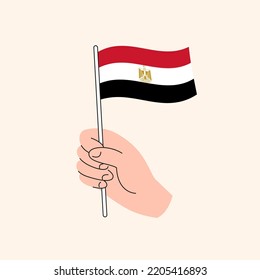 Mano de caricatura que sostiene la bandera egipcia, la bandera de Egipto, Concepto Ilustración. Vector aislado de diseño plano.