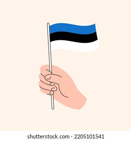 Cartoon Hand Holding Estonian Flag, The Flag of Estonia, Concept Illustration. Flat Design Isolated Vector.