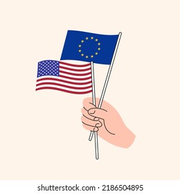 Cartoon Hand Holding European Union And United States Flags. EU and US Relationships. Concept of Diplomacy, Politics And Democratic Negotiations. Flat Design Isolated Vector