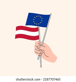 Cartoon Hand, die die Flagge der Europäischen Union und Österreichs hält. Beziehungen zwischen der EU und Österreich. Konzept der Diplomatie, der Politik und der demokratischen Verhandlungen. Flaches Design, isolierter Vektorgrafik