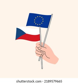 Cartoon Hand Holding European Union And Czech Flags. EU Czech Republic Relationships. Concept of Diplomacy, Politics And Democratic Negotiations. Flat Design Isolated Vector