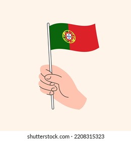 Cartoon Hand Holding Portuguese Flag. Flag of Portugal, Concept Illustration, Flat Design Isolated Vector.