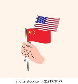 Cartoon Hand Holding United States And Chinese Flags. US China Relationships. Concept Of Diplomacy, Politics And Democratic Negotiations. Flat Design Isolated Vector