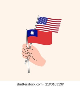 Cartoon Hand Holding United States And Taiwanese Flags. US Taiwan Relationships. Concept of Diplomacy, Politics And Democratic Negotiations. Flat Design Isolated Vector