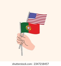Cartoon Hand Holding United States And Portuguese Flags. US Portugal Relationships. Concept of Diplomacy, Politics And Democratic Negotiations. Flat Design Isolated Vector