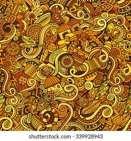 Cartoon hand-drawn doodles on the subject of Africa style theme seamless pattern. Colorful vector background