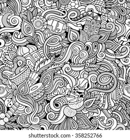 Cartoon hand-drawn doodles on the subject of Indian style theme seamless pattern. Contour vector background