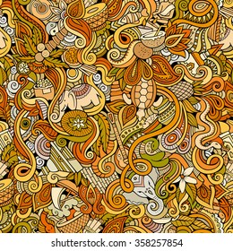 Cartoon hand-drawn doodles on the subject of Indian style theme seamless pattern. Color vector background