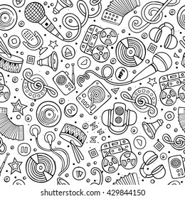 Cartoon hand-drawn musical instruments seamless pattern. Lots of music symbols, objects and elements. Perfect funny line art tile vector background.