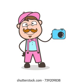 Cartoon Happy Adult Salesman Showing a Camera for Advertisement