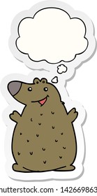 cartoon happy bear with thought bubble as a printed sticker
