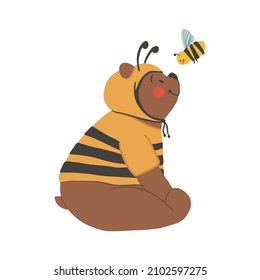 Cartoon happy bear wearing bee costume isolated on white background. Vector childish brown bear in wasp clothes illustration. Cute flat character perfect for textile, sticker, poster, card