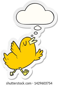 cartoon happy bird with thought bubble as a printed sticker
