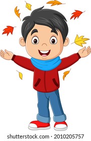 Cartoon happy boy with autumn leaves