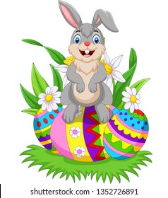 Cartoon happy bunny with colorful Easter eggs 