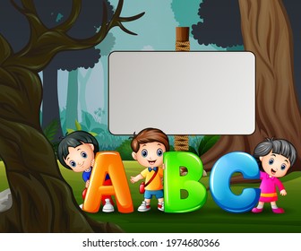 Cartoon happy children holding ABC letter in the park