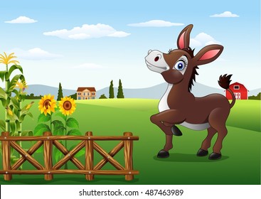 Cartoon happy donkey with farm background