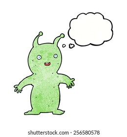 cartoon happy little alien with thought bubble
