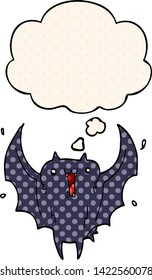 cartoon happy vampire bat with thought bubble in comic book style