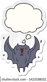 cartoon happy vampire bat with thought bubble as a printed sticker