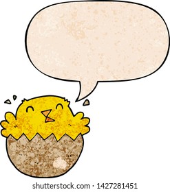 cartoon hatching chick with speech bubble in retro texture style
